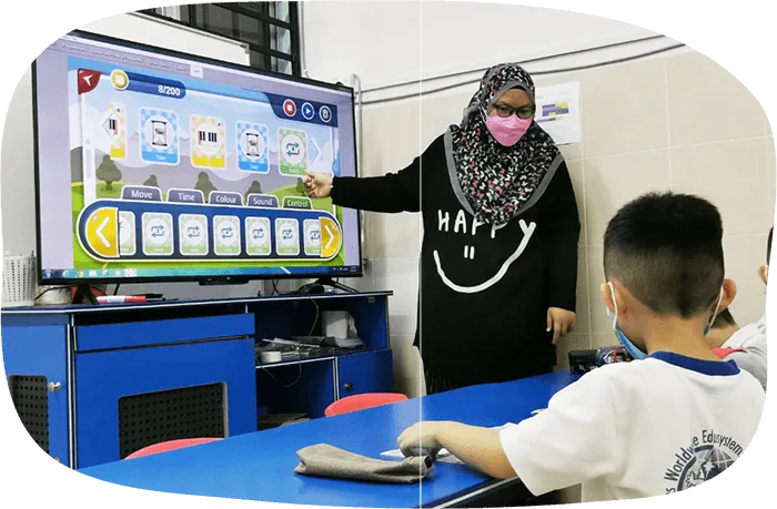 Teacher guiding a student during a lesson