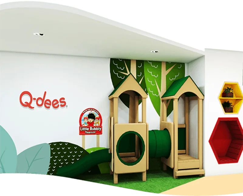 Inside a Q-dees centre: colourful play house and learning corner