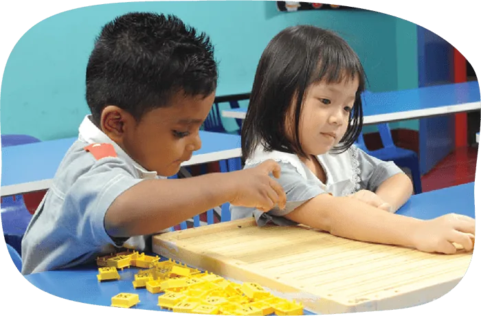 Students working with counting materials