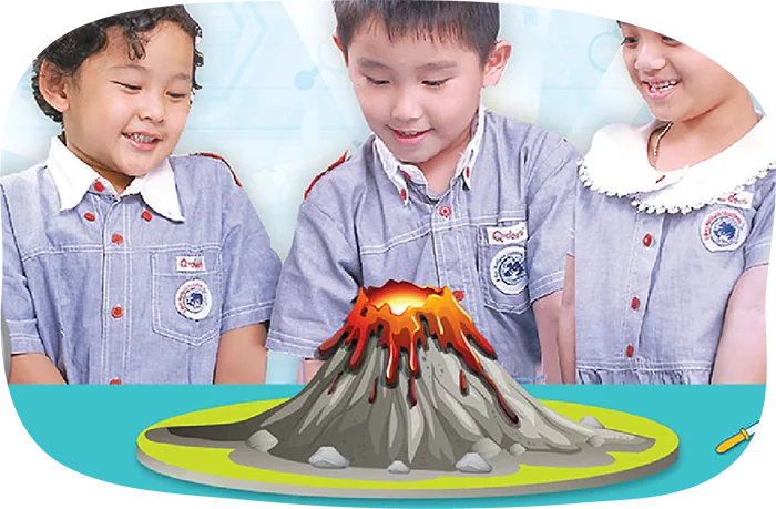 Students watching a volcano science experiment